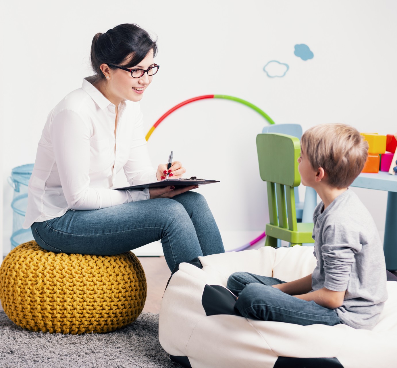 woman-talking-with-a-child-on-a-beanbag